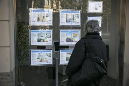 Inmobiliaria de compraventa de pisos y locales.-JOAN CORTADELLAS