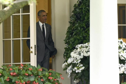 Barack Obama sale del despacho oval de la Casa Blanca.-AP / SUSAN WALSH