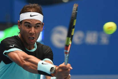 Rafael Nadal, durante el partido contra Wu Di, su debut en el Abierto de China.-AFP / GOH CHAI HIN
