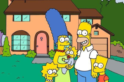 Los protagonistas de la serie de dibujos animados Los Simpson frente a su casa.-AP