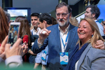 El presidente del Gobierno, Mariano Rajoy, en la convención nacional del PP en Sevilla.-EFE / JULIO MUÑOZ