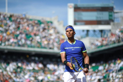 Rafael Nadal durante su partido contra Robin Haase.-ERIC FEFERBERG / AFP