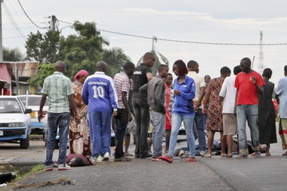 Calle de la capital de Burundi,Bujumbura, después de la masacre.-AP / STR