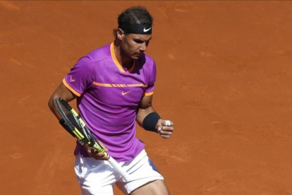 Rafael Nadal celebra su victoria ante Djokovic.-EFE / KIKO HUESCA