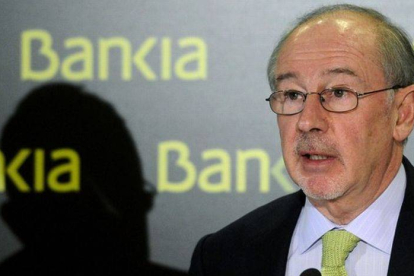Rodrigo Rato, en una rueda de prensa de presentación de resultados de Bankia, en febrero del 2012.-Foto: AFP / DOMINIQUE FAGET