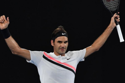 Federer celebra su victoria.-AFP / PAUL CROCK