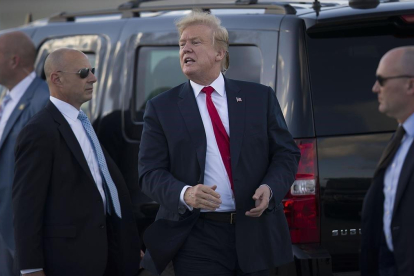 Trump a su llegada a Florida para pasar la Semana Santa.-AFP / JOE RAEDLE