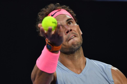 Rafael Nadal, concentrado, ante Cilic.-AFP / PAUL CROCK