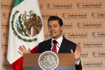 El presidente de Mexico, Enrique Pena Nieto, participa en la decimosexta edicion de Mexico Cumbre de Negocios, con el tema 'Enfrentar los retos estrategicos de Mexico y la Region' en la Expo Guadalajara de Jalisco.-EFE / FRANCISCO GUASCO