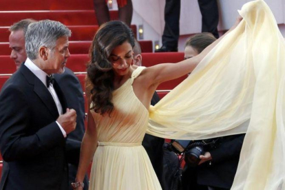 George Clooney y Amal, en el festival de Cannes.-REUTERS / ERIC GAILLARD