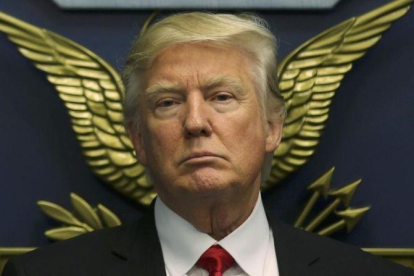 El presidente estadounidense, Donald Trump, en el juramento del nuevo secretario de defensa, James Mattis.-CARLOS BARRIA