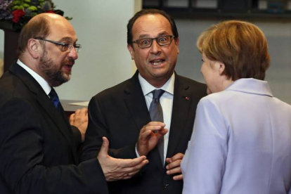 Martin Schulz, François Hollande y Angela Merkel, el pasado 25 de junio en Bruselas.-Foto: EFE / JULIEN WARNAND