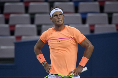 Rafa Nadal se lamenta tras perder un punto.-WANG ZHAO / AFP