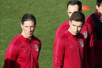 Torres y Gabi, durante el entrenamiento de este martes en la ciudad deportiva del Atlético.-EFE / ÁNGEL DÍAZ