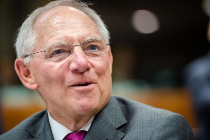German Finance Minister Wolfgang Schauble smiles as he arrives for an EU finance ministers meeting at the European Council building in Brussels, Tuesday, July 8, 2014. (AP Photo/Geert Vanden Wijngaert)-Geert Vanden Wijngaert / AP