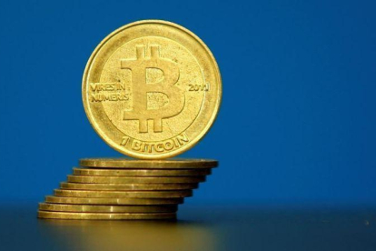 Monedas bitcoins.-REUTERS / BENOIT TESSIER