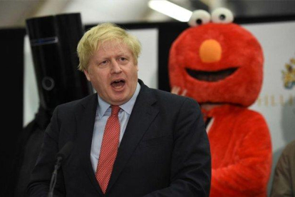 Boris Johnson celebrando el triunfo electoral en el Reino Unido.-AFP