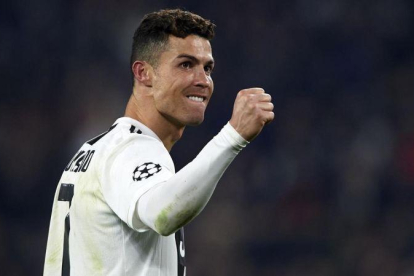 Cristiano Ronaldo celebra la victoria sobre el Atlético en Champions.-EL PERIÓDICO