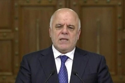 El primer ministro de Irak, Haider al-Abadi, durante su discurso en televisión.-REUTERS / TV
