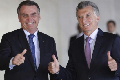 Jair Bolsonaro y Mauricio Macri, el 16 de enero del 2019 en Brasilia.-AP / ERALDO PERES