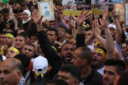 Manifestación de familiares de presos palestinos.-EPA / ALAA BADARNEH