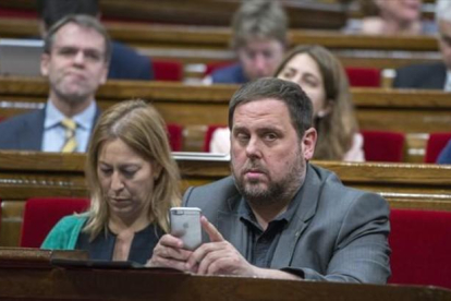 El vicepresidente económico de la Generalitat, Oriol Junqueras, en el Parlament.-FERRAN SENDRA