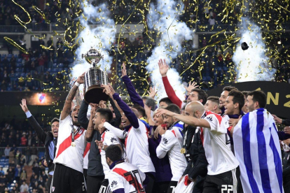 Los jugadores de River celebrando la Copa Libertadores.-AFP