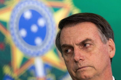 El presidente electo de Brasil  Jair Bolsonaro y el actual mandatario  Michel Temer  fuera de cuadro  ofrecen una declaracion conjunta en el Palacio del Planalto  sede del Gobierno.-JOEDSON ALVES (EFE)