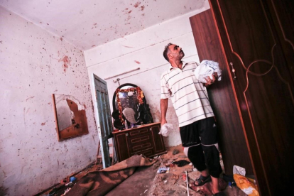 Los restos de la casa donde la palestina embarazada y su hija de 18 meses murieron por un misil israelí.-SAID KHATIB (AFP)