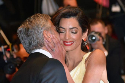 George y Amal Clooney, el pasado mayo en Cannes.-AFP / LOIC VENANCE
