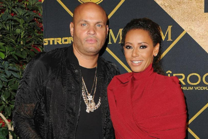 Mel B y su entonces marido Stephen Belafontem, en julio del año pasado, en Los Ángeles.-JON KOPALPFF