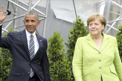 Obama y Merkel, en Berlín.-EFE / CLEMENS BILAN