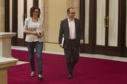 Marta Rovira y Jordi Turull, en el Parlament.-DANNY CAMINAL