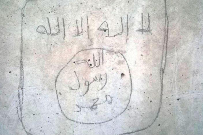 Pintada yihadista aparecida en la prisión de Estremera en mayo del 2017.-EL PERIÓDICO