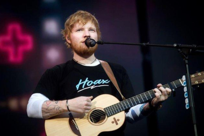 El cantante, compositor y guitarrista británico Ed Sheeran durante su concierto en el Wanda Metropolitano de Madrid.-EFE / LUCA PIERGIOVANNI