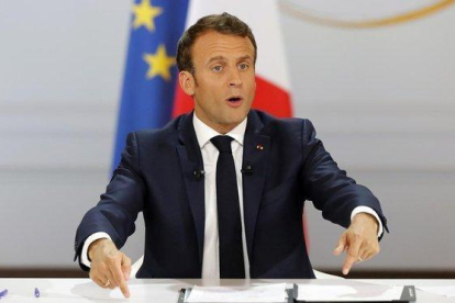 El presidente francés, Emmanuel Macron, durante la rueda de prensa que ha ofrecido en el Elíseo.-MICHEL EULER (AP)