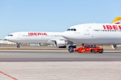 Aviones de Iberia en una imagen de archivo.-EL PERIÓDICO