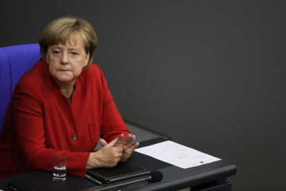 Angela Merkel en el Bundestag.-MARKUS SCHREIBER / AP