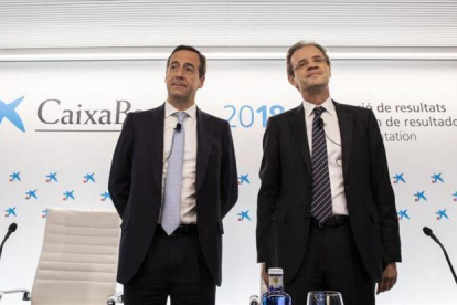 El presidente de CaixaBank, Jordi Gual, y el consejero delegado, Gonzalo Gortázar, presentan los resultados de Caixabank correspondientes al ejercicio 2018.-MIGUEL LORENZO