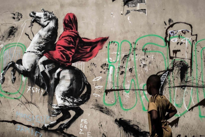 Uno de los últimos trabajos de Banksy, en París.  /-AFP / PHILIPPE LOPEZ