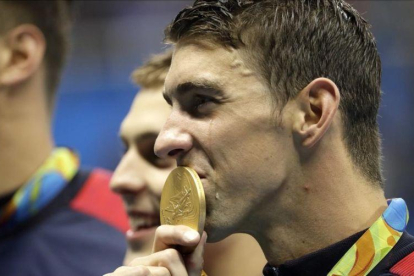 Michael Phelps, con la medalla de oro.-AP DAVID J. PHILLIPS