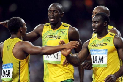 Frater, Bolt, Powell y Nesta Carter, el cuarteto de relevos de Jamaica en los JJOO de Pekín-2008.-EFE / FRANCK ROBICHON