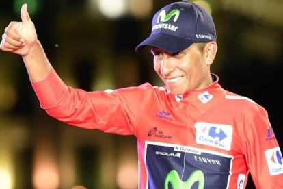 Quintana celebra su triunfo en la Vuelta a España-2016.-AFP / JOSE JORDAN