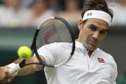Federer en su partido ante Lacko-KIRSTY WIGGLESBOURGH