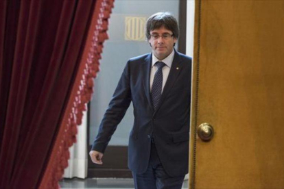 El 'president' Carles Puigdemont, en el Parlament.-FERRAN SENDRA