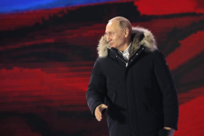 El presidente ruso, Vladimir Putin, en un acto de campaña el 18 de marzo en Moscú.-/ YURI KOCHETKOV (EFE)
