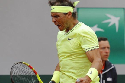Rafa Nadal celebra la conquista de un punto ante Federer.-