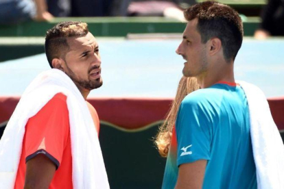 Kyrgios y Tomic, tras su exhibición en Kooyong.-AFP