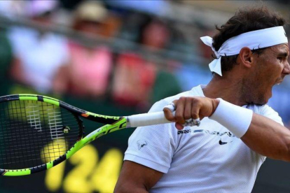 Rafael Nadal, en su partido ante Gilles Muller.-AFP / GLYN KIRK