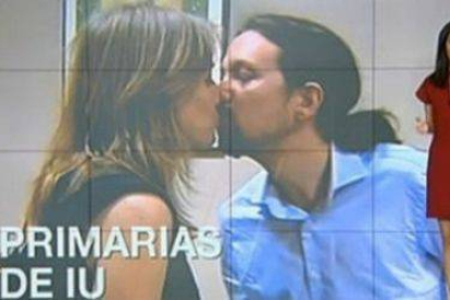 El informativo de Telemadrid ilustró el domingo las primarias de IU con una imagen de Tania Sánchez besando a Pablo Iglesias.-Foto: TELEMADRID